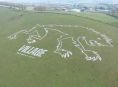 Giant chalk Lycan painted on Somerset hill to promote Resident Evil Village