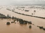 Floods in Australia claim four lives, tens of thousands stranded