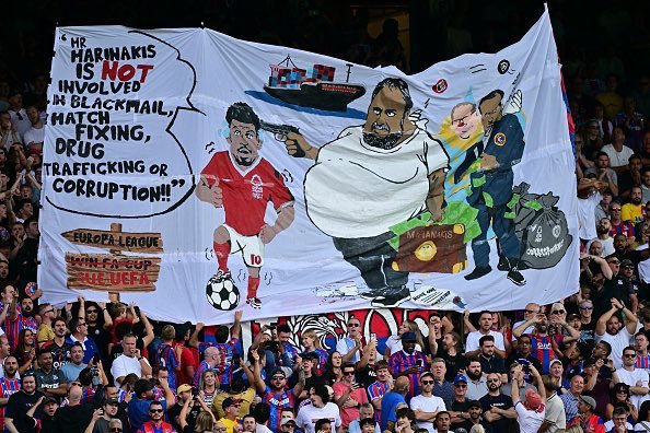 English Football Association charges Crystal Palace for banner showing Marinakis holding a gun