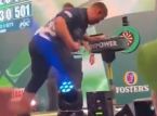 Professional darts player Cameron Menzies apologises after smacking a table and damaging his knuckles