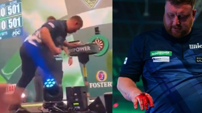 Professional darts player Cameron Menzies apologises after smacking a table and damaging his knuckles
