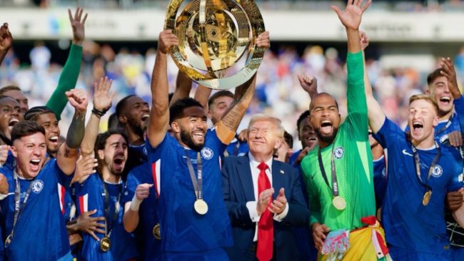 Donald Trump photobombs Chelsea's victory photo and the Internet reacts