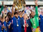 Donald Trump photobombs Chelsea's victory photo and the Internet reacts