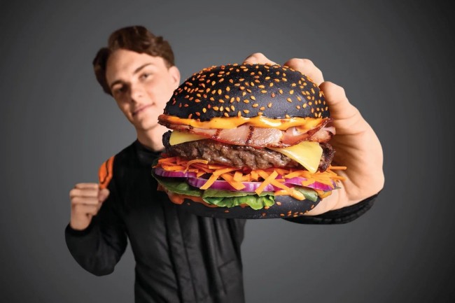 Australian burger chain forced to update promotion offering free burgers after Oscar Piastri's podium finishes