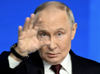 Annual end-of-year press conference: Sarcastic messages flash on screen during Putin's speech
