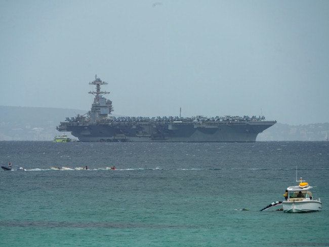 Trump sends fighter jets to "kick the door down" in Iran