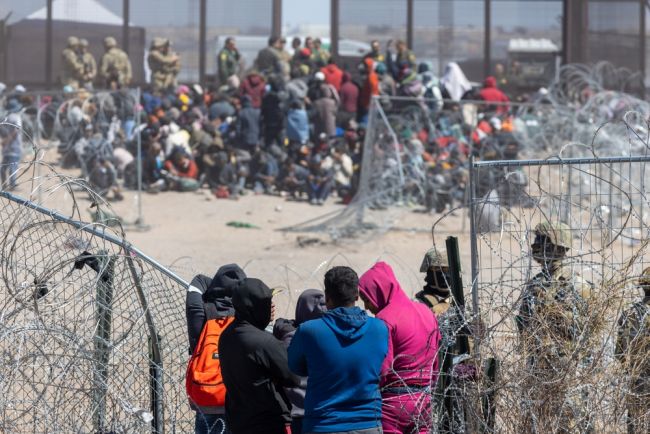 US court blocks Trump effort to revoke migrants' legal status