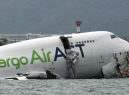 Cargo plane skids off Hong Kong runway into sea