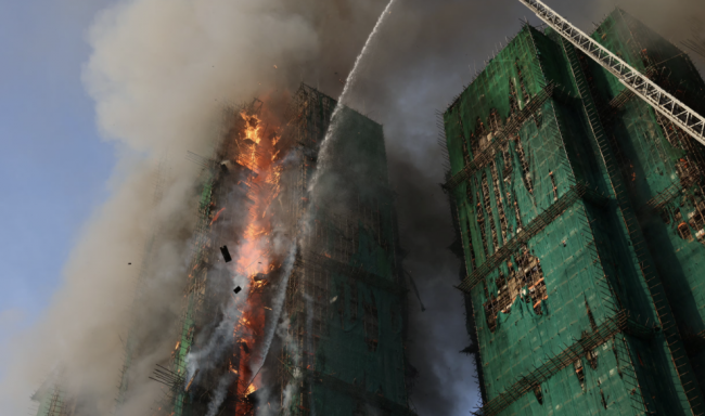 Hong Kong orders judge-led inquiry after fire kills 156
