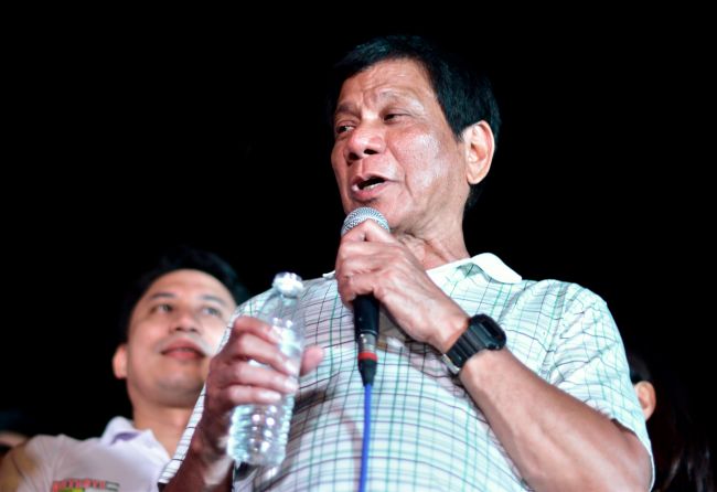 Duterte's daughter decries his secretive transfer after arrest