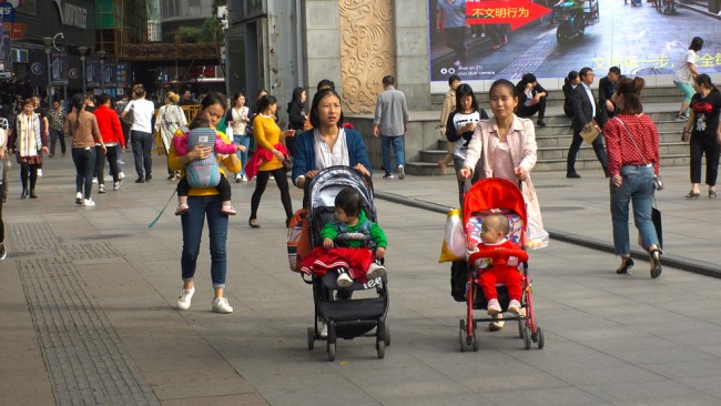 China's population declines again as birthrate hits record low