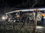 At least 1 dead and 15 injured after commuter train derails near Barcelona