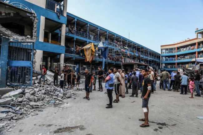 Israeli airstrikes hit Gaza school, killing 13 civilians