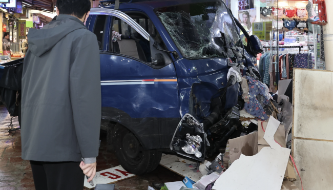 At least 2 dead and 18 injured after truck crashes into South Korean market