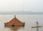 Floods in China leave dozens dead as extreme heat hits the country